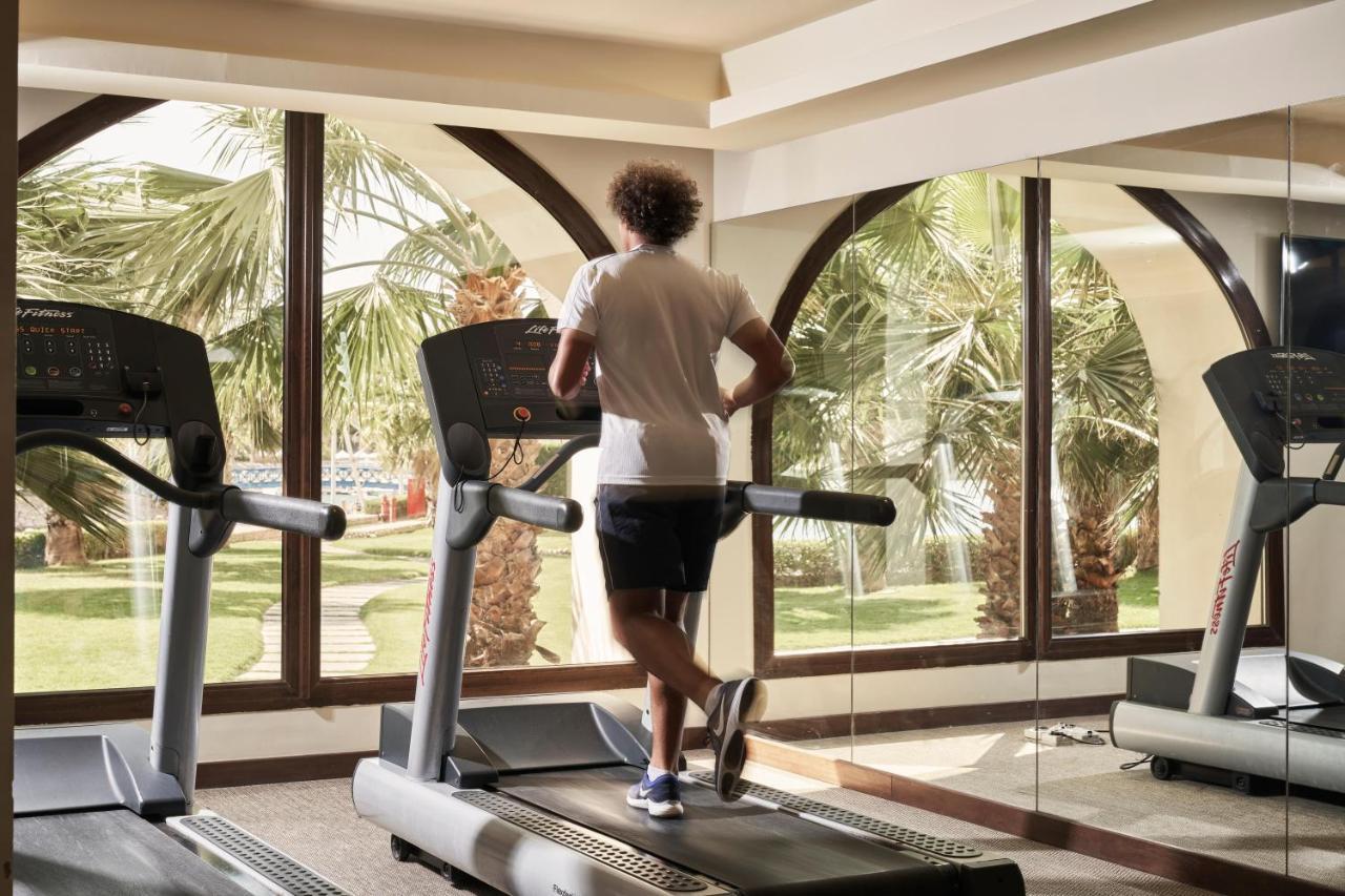 Fanar Hotel & Residences Салала Экстерьер фото A treadmill in use