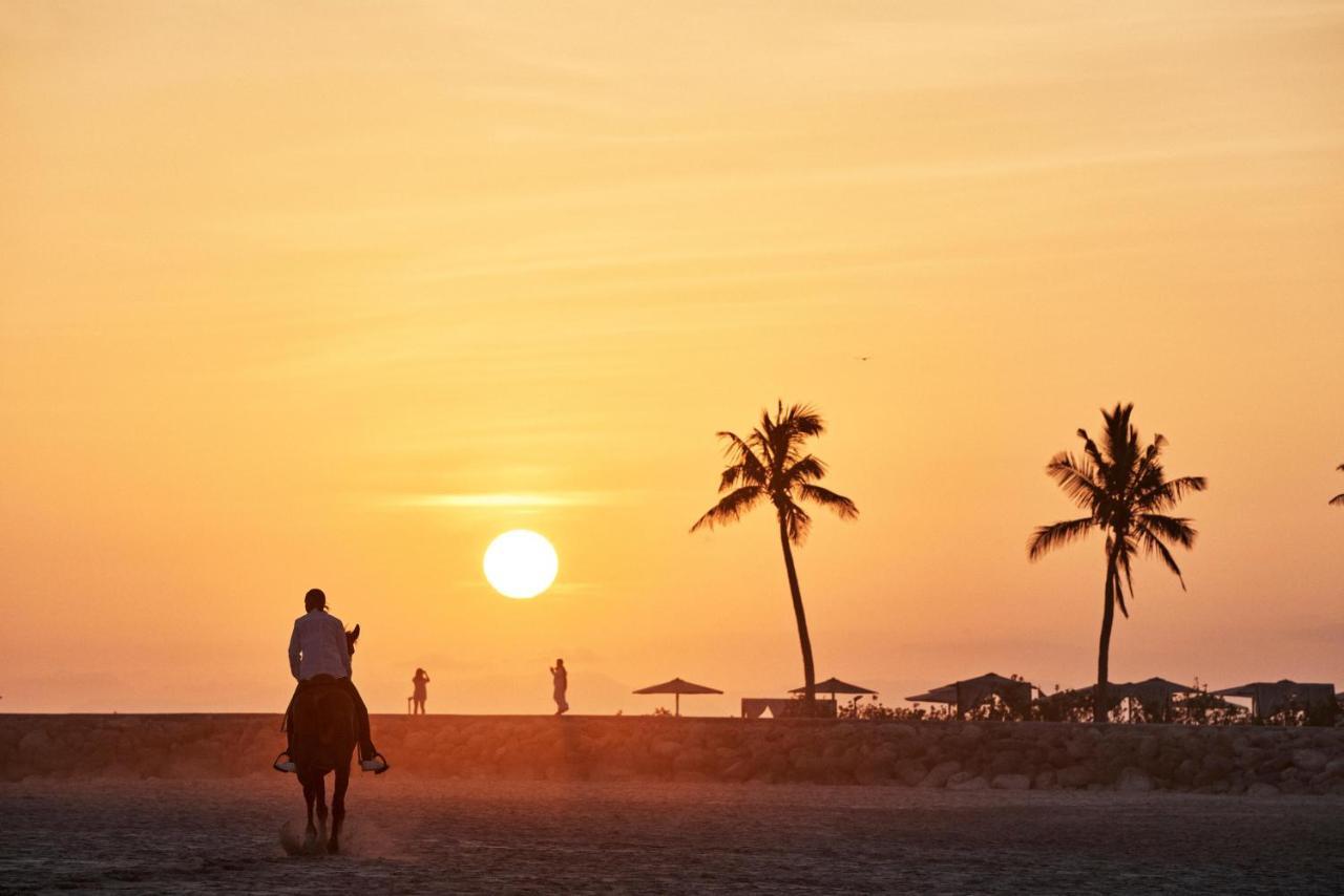 Fanar Hotel & Residences Салала Экстерьер фото Sunset at Jumeirah Beach